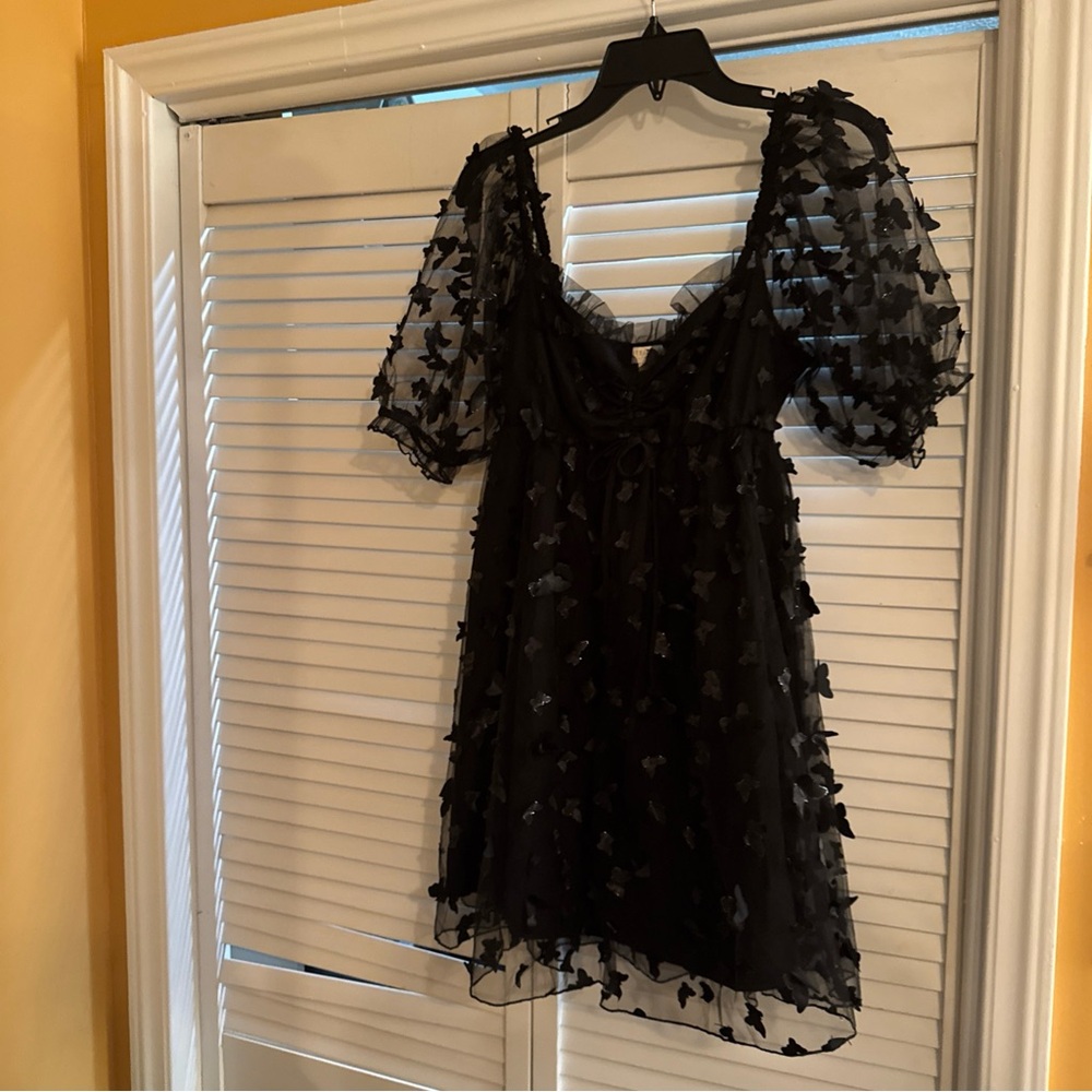 Chic Black Mini Dress with Floral Accents